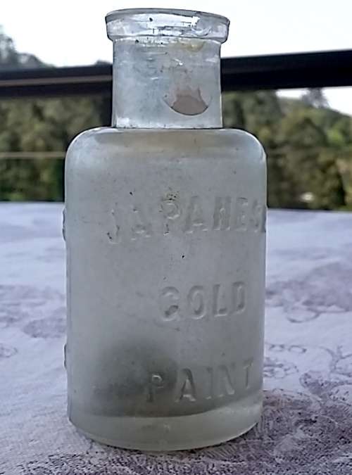 1890's Gerstendorfer Bros New York Chicago Embossed 'Japanese Gold Paint' Glass Bottle