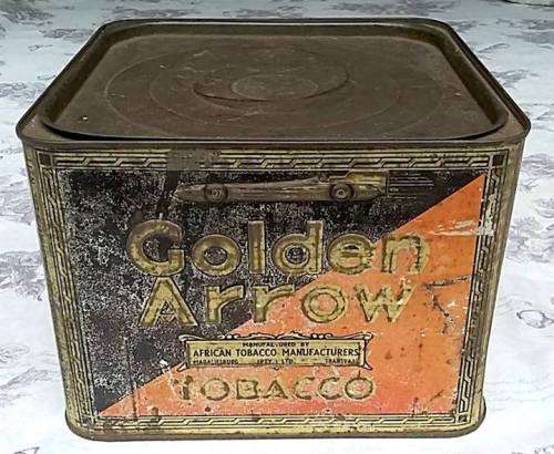 Vintage English/ Afrikaans Golden Arrow Tobacco Tin with embossed Golden Arrow Racing Car Icon