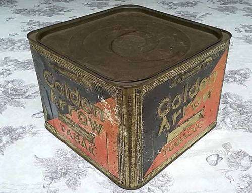 Vintage English/ Afrikaans Golden Arrow Tobacco Tin with embossed Golden Arrow Racing Car Icon