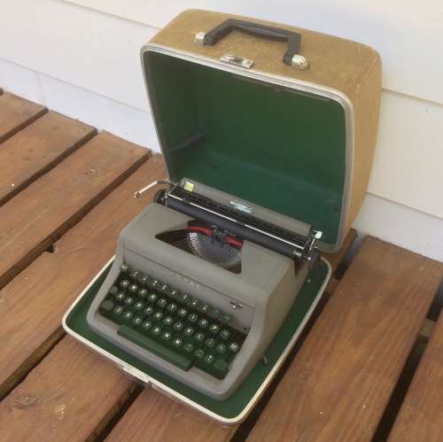 Original Olive Green Royal Senior Companion Portable Typewriter sold WITH RIBBONS!