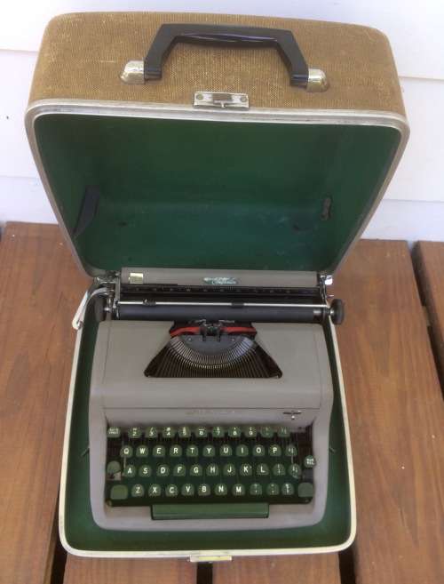 Original Olive Green Royal Senior Companion Portable Typewriter sold WITH RIBBONS!