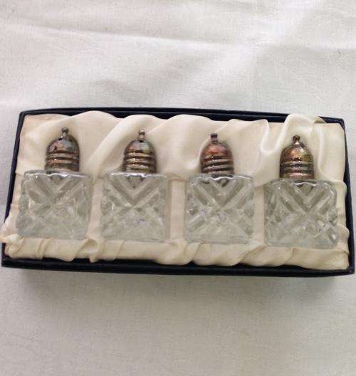 2 VINTAGE GLASS SALT & PEPPER SETS IN ORIGINAL BOX.