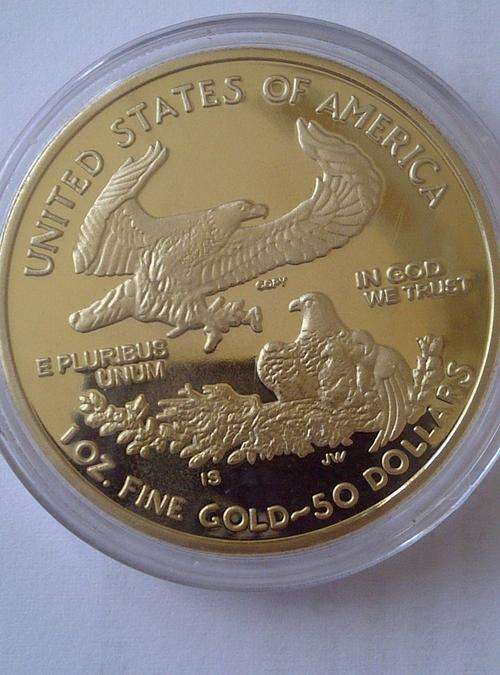 ## 1 oz.100 mills .999 Fine Gold Clad American Eagle / Statue of Liberty Coin - 50 Dollars. SEALED!