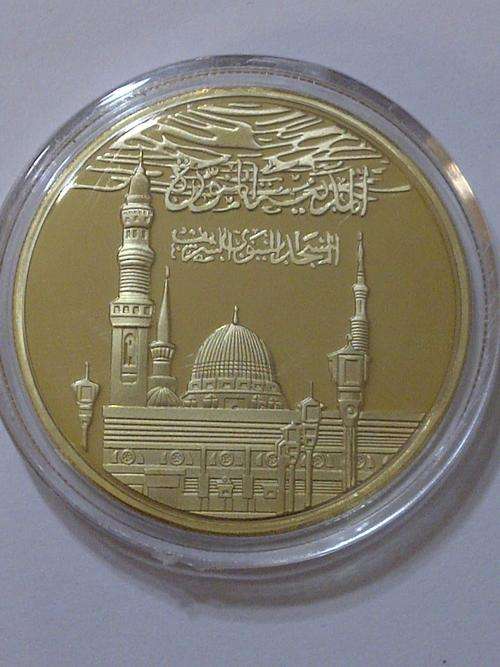 ### 1 oz SAUDIA ARABIA MEDINA GOLD CLAD COIN!! A MUST HAVE!! ###