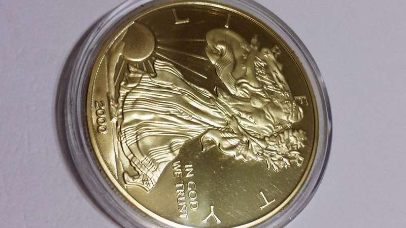 .999 FINE GOLD - 100 MILLS - ENCAPSULATED UNITED STATES OF AMERICA LIBERTY GOLD CLAD - EAGLE.