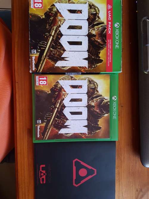 Doom Xbox One with extras (as new condition)