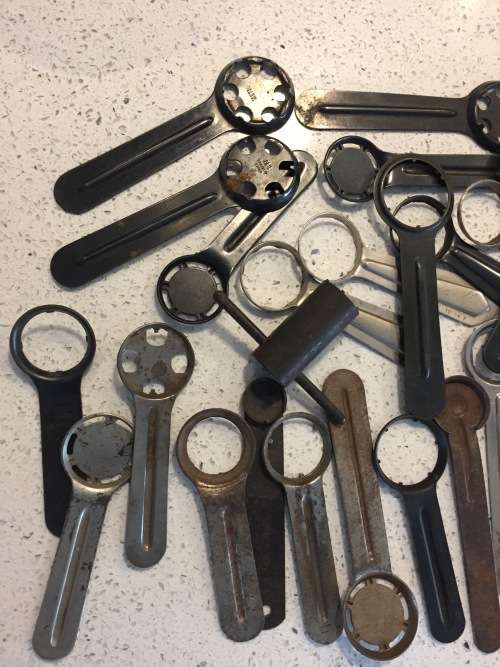 Vintage watch case openers