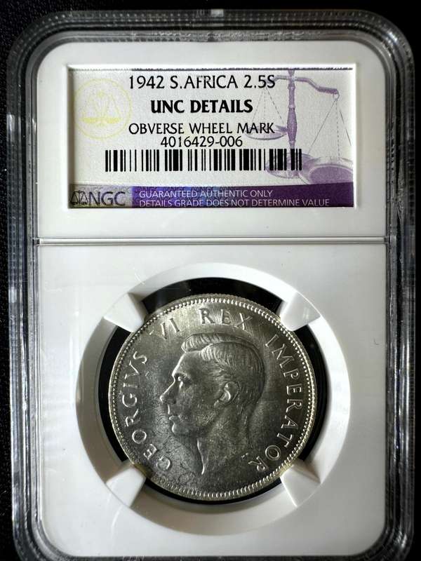 1942***2.5S***UNC details***NGC, obverse wheel mark, in SA coins, that is a tell on unc..