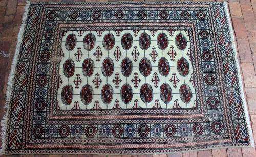 Beautiful hand-knotted Bokhara Oriental carpet.