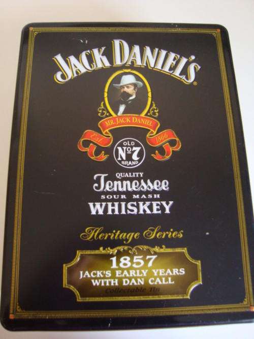old collectable JACK DANIELS tin with bottle and two tumblers