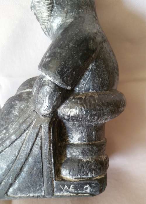 An ORIGINAL WOLF sculpture of Eskimo with sleigh
