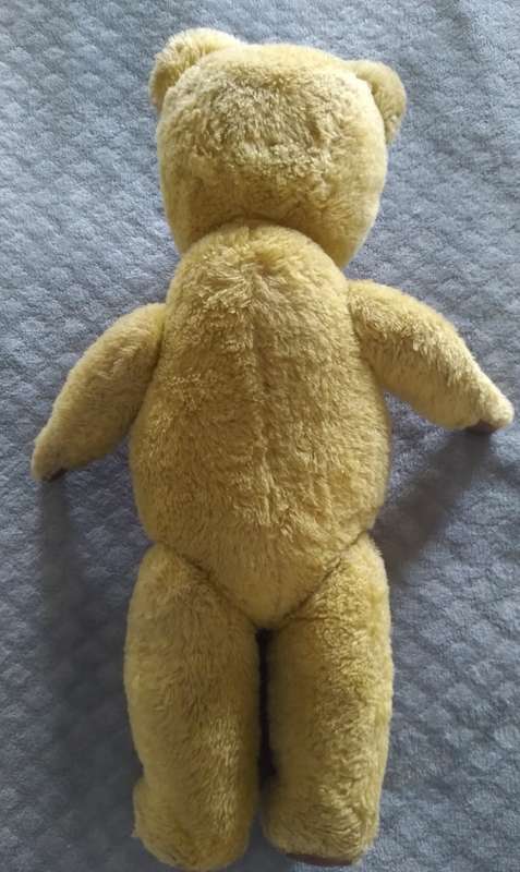 vintage Teddy Bear with moveable neck arms and legs