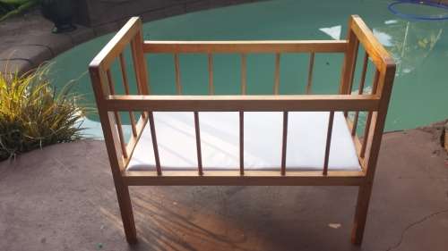 Awesome pine dolls cot.