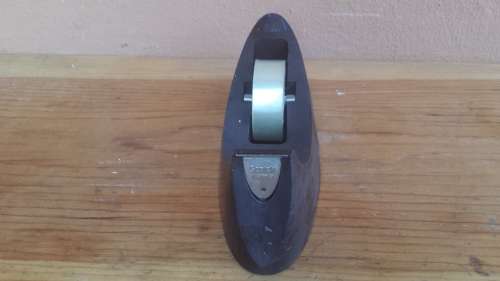 Small old tape dispenser.