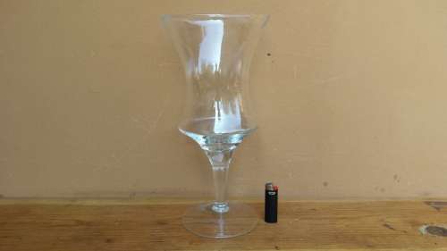 Large stemmed glass vase.