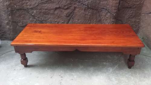 Beautiful, long solid wood coffee table.