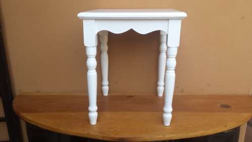 Lovely white side table.