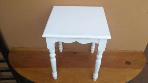 Lovely white side table.