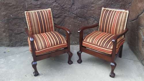 Pair of small, old imbuia arm chairs.