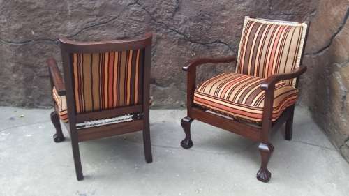 Pair of small, old imbuia arm chairs.