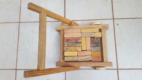Old wooden block trolley.