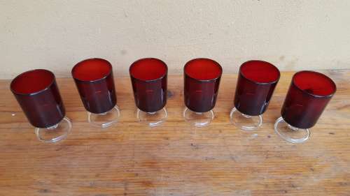 Set of 6 cranberry red sherry glasses.