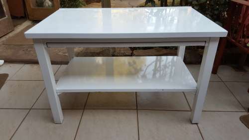 Solid metal table.