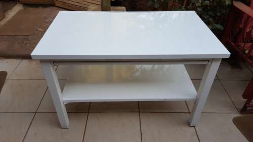 Solid metal table.