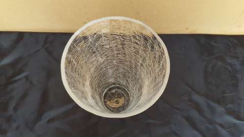 Large shattered glass vase.