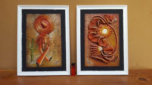Beautiful pair of signed art pieces.
