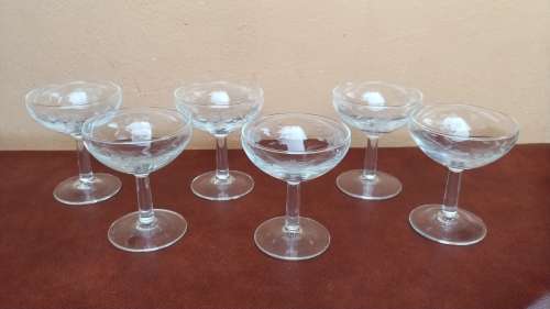 Set of 6 grape cut champagne glasses.