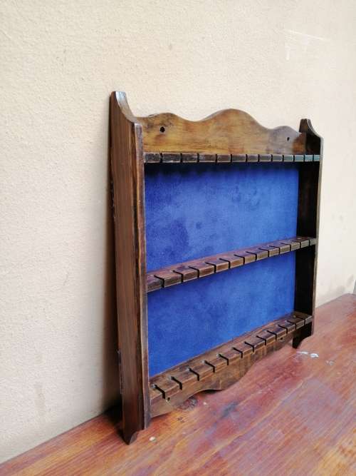 Beautiful, wooden antique teaspoon rack.