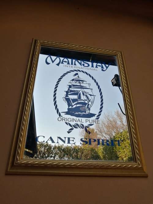 Beautiful, large Mainstay bar mirror.