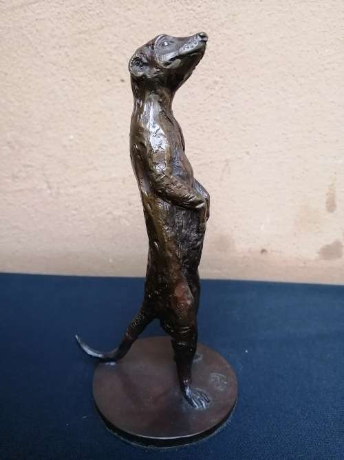 Solid bronze meerkat sculpture by Sarah Richards.