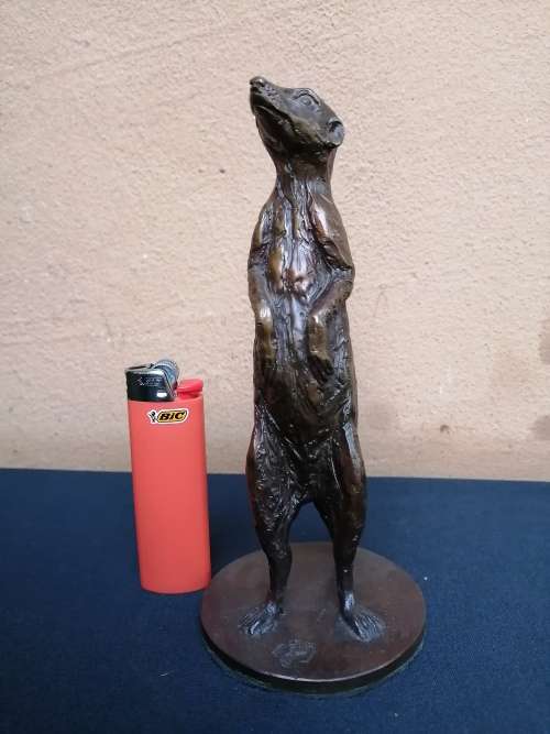 Solid bronze meerkat sculpture by Sarah Richards.