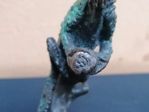 Solid bronze chameleon, sculpture by Sarah Richards.