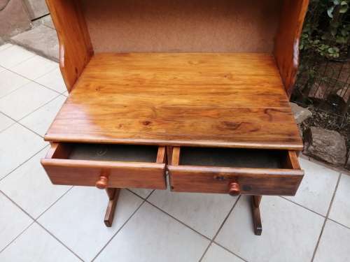 Tall, pine shelved study desk.