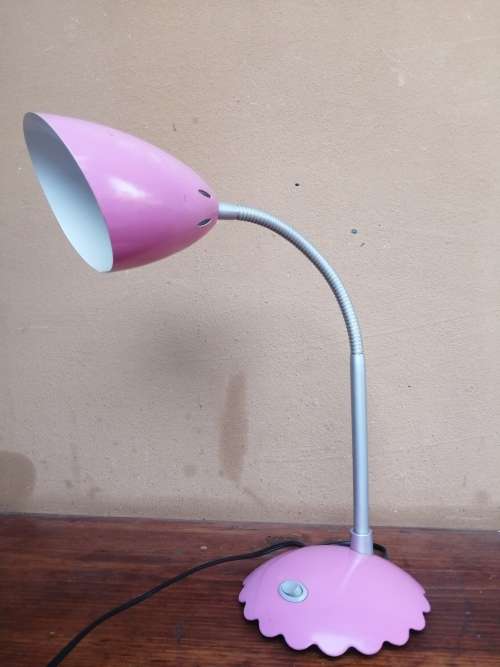 Pretty little pink desk lamp.