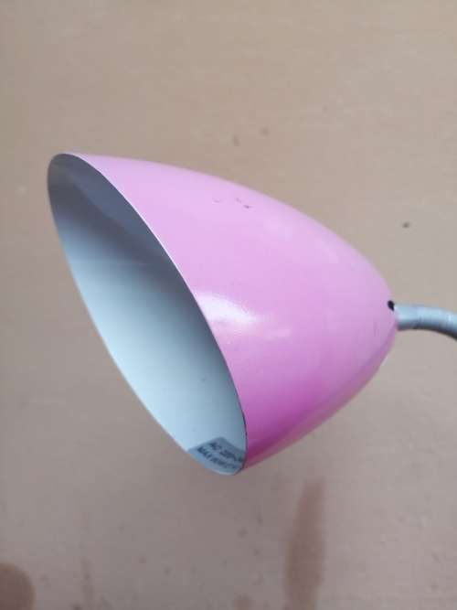 Pretty little pink desk lamp.