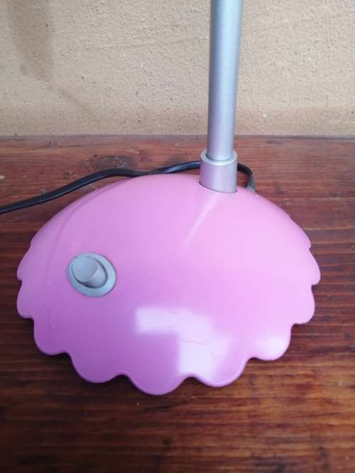 Pretty little pink desk lamp.