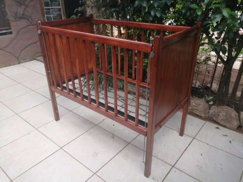 Lovely old solid wood cot.
