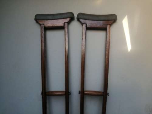 Awesome pair of old wooden crutches.