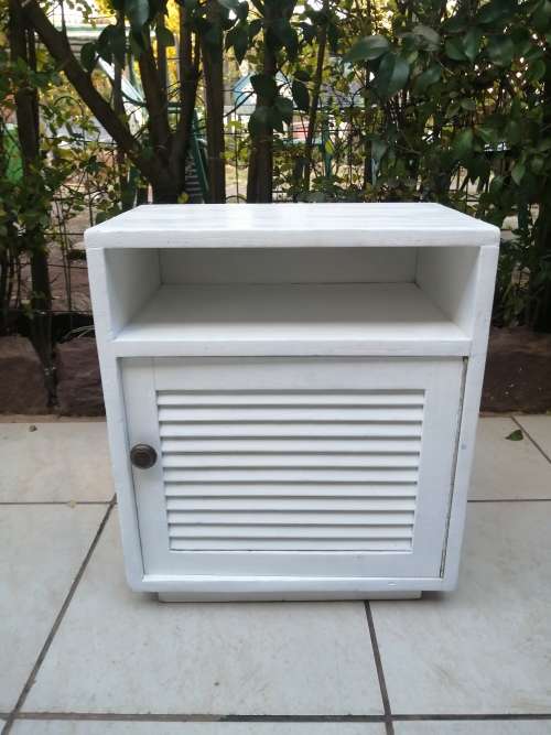 Single white bedside cabinet.