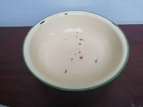 Very old medium size enamel bowl.