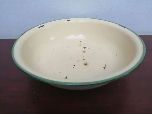 Very old medium size enamel bowl.