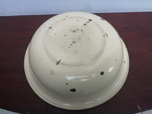 Very old medium size enamel bowl.