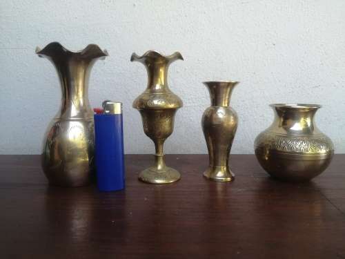Collection  of 4 small brass posy vases.