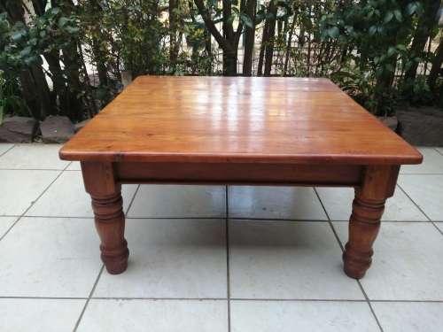 Beautiful large square solid wood coffee table.