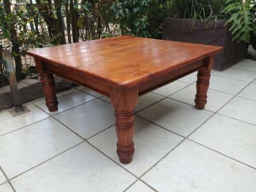 Beautiful large square solid wood coffee table.