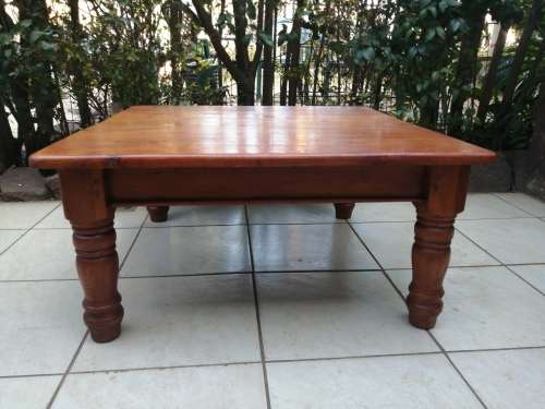 Beautiful large square solid wood coffee table.